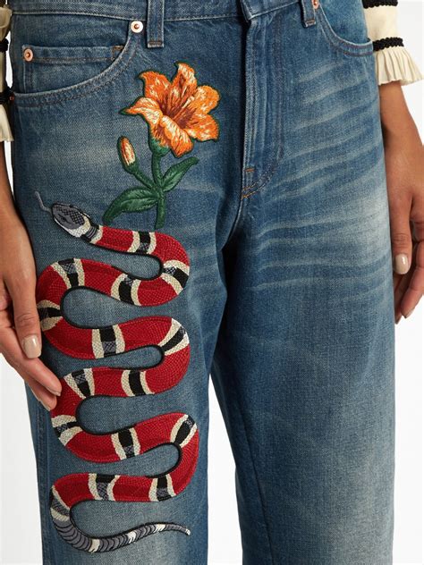 jean gucci snake|Gucci snake jeans women.